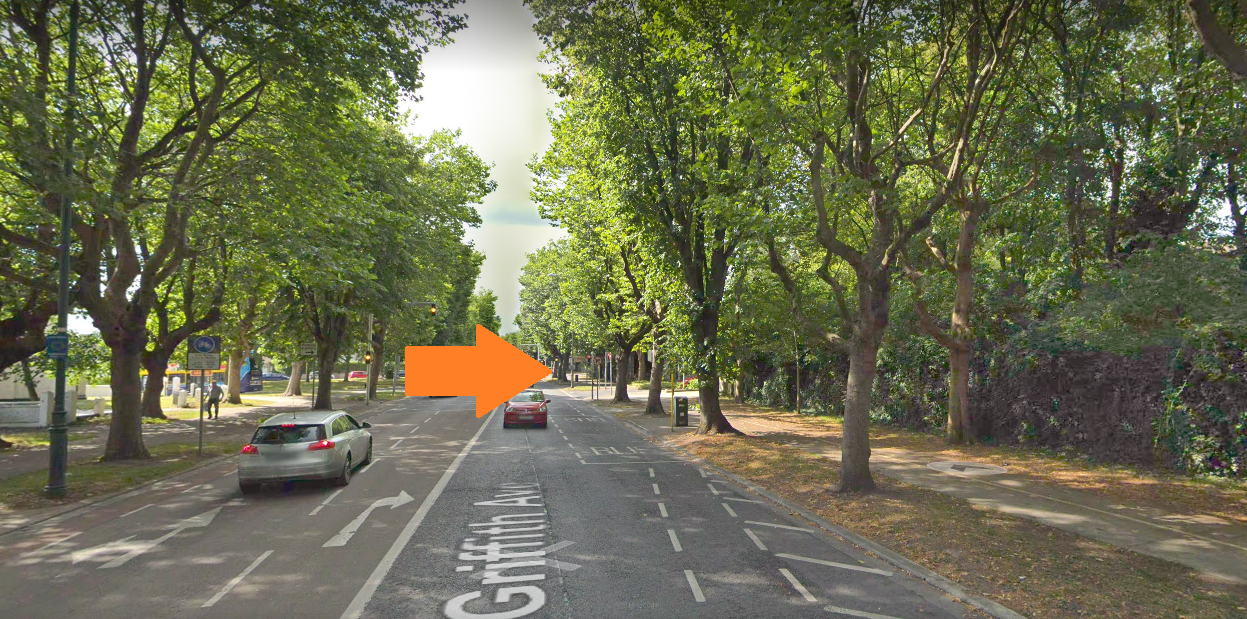 Image of a road, Griffith Avenue with an orange arrow halfway down pointing to turn right