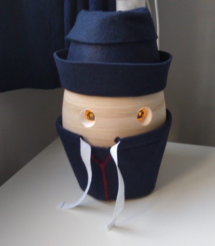 The robot Tessa (or Jack) - looks like an egg wearing a blue jacket and hat